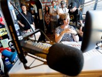 Surrounded by current and former DJ's, WUMD station manager, Jennifer Mulcare-Sullivan, is overcome with emotion as she signs off for the last time over the air as the station transitions to an online only broadcast.  The University of Massachusetts Dartmouth radio station, WUMD, stopped broadcasting over the airwaves after 42 continuous years.   It will now continue to broadcast strictly over the internet at www.umd.rocks   [ PETER PEREIRA/THE STANDARD-TIMES/SCMG ]